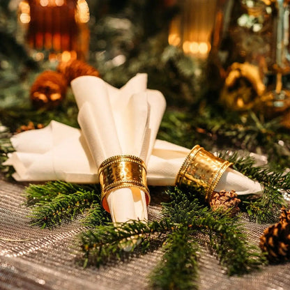 Set of 4 napkin rings - hammered metal color gold